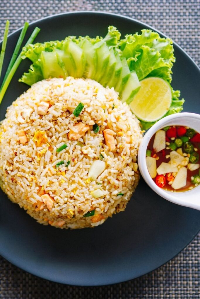 Discover 25 delicious salmon and rice recipes perfect for lunch or dinner! From zesty bowls to sweet and savory classics, these quick and healthy meals are sure to impress. Canned Salmon Fried Rice Recipes, Rice Recipes For Dinner Salmon, Salmon Rice Bowl Recipes Mango, Quick Salmon And Rice Recipes, Salmon And Rice Recipes Healthy, Grilled Salmon Recipes With Rice, Jasmine Rice And Salmon Recipes, Salmon Avocado Recipes Rice Bowls, White Rice And Salmon Recipes, Salmon Recipe With Cilantro Lime