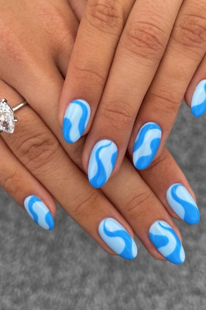 Get inspired with these stunning blue summer nail designs! From ocean swirls to floral details and playful patterns, find the perfect manicure for your next sunny-day vibe. Summer Nails Blue, Summer Blue Nails, Light Blue Summer Nails, Summer Nails Baby Blue, Baby Blue Summer Nails, Summer Nails Light Blue