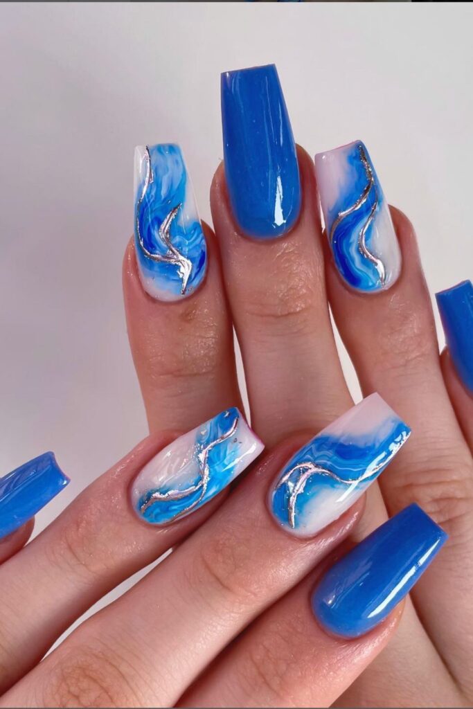 Get inspired with these stunning blue summer nail designs! From ocean swirls to floral details and playful patterns, find the perfect manicure for your next sunny-day vibe. Summer Nails Blue, Summer Blue Nails, Light Blue Summer Nails, Summer Nails Baby Blue, Baby Blue Summer Nails, Summer Nails Light Blue