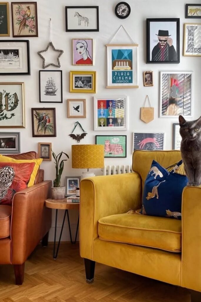 Create a stunning eclectic gallery wall with our expert tips on layout, art selection, and styling. Discover unique ideas for staircases, living rooms, and more to curate a bold and personal display! Eclectic Gallery Wall Ideas, Eclectic Gallery Wall Over Couch, Living Room Gallery Wall, Eclectic Gallery Wall Around Tv, Eclectic Gallery Wall Over Sofa, Inspiration, Colorful, Eclectic Gallery Wall Entryway, Eclectic Gallery Wall Hallway, Mixed Art Styles, Stairs, Wall Paintings, Tips, Layout