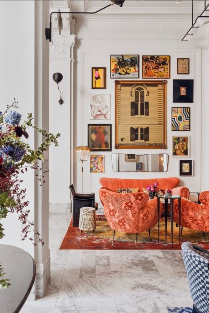 Create a stunning eclectic gallery wall with our expert tips on layout, art selection, and styling. Discover unique ideas for staircases, living rooms, and more to curate a bold and personal display! Eclectic Gallery Wall Ideas, Eclectic Gallery Wall Over Couch, Living Room Gallery Wall, Eclectic Gallery Wall Around Tv, Eclectic Gallery Wall Over Sofa, Inspiration, Colorful, Eclectic Gallery Wall Entryway, Eclectic Gallery Wall Hallway, Mixed Art Styles, Stairs, Wall Paintings, Tips, Layout