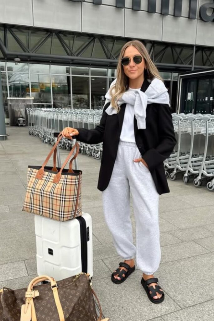 Travel in style with comfy airport outfits—chic, cozy looks perfect for long flights, layovers, and hassle-free travel days. Airport Outfit Comfy, Comfy Airport Outfit Summer, Plane Outfit Airport Style Comfy, Comfy Airport Outfit Long Flight, Comfy Airport Outfit Summer Casual, Comfy Cute Airport Outfit, Airport Outfit Comfy Long Flight, Airport Outfit Comfy Travel Style, Airport Outfit Ideas Comfy, Flight Outfit Airport Style Comfy, Airport Outfits Comfy