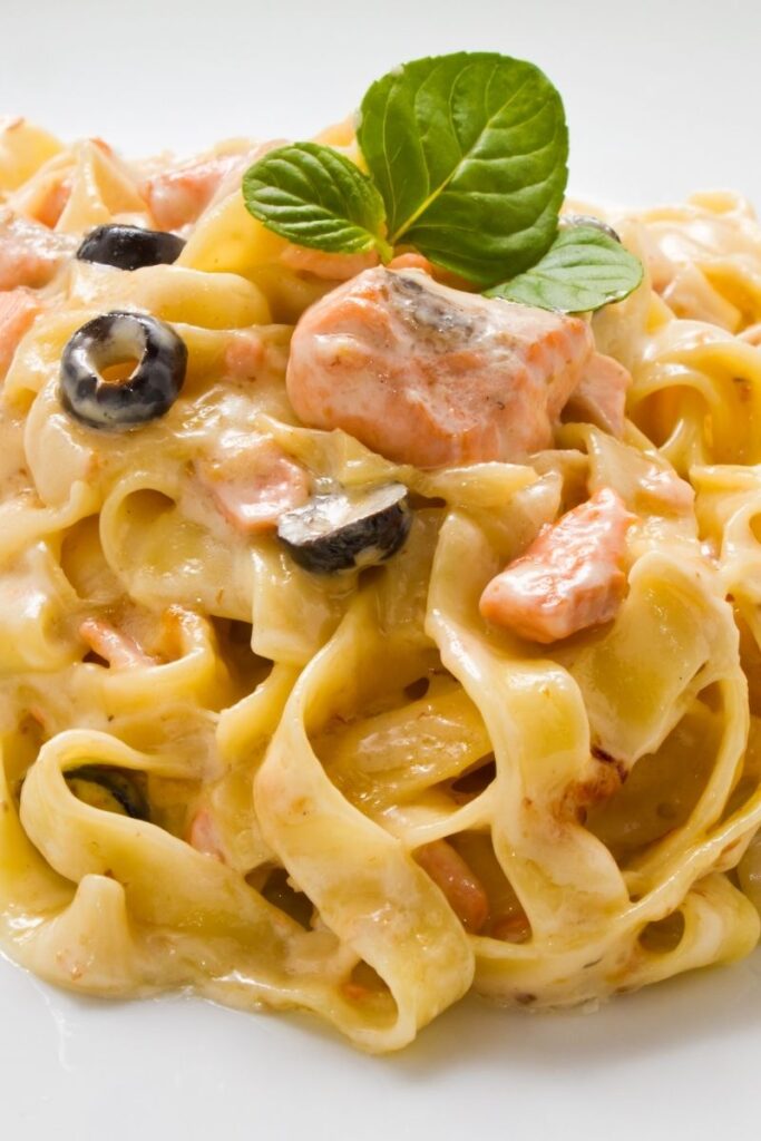 Discover 23 irresistible salmon pasta recipes perfect for lunch or dinner! From creamy garlic sauces to zesty lemon and smoked salmon dishes, these easy and delicious meals will elevate your pasta game. Get the full recipes now! Jerk Salmon Pasta Recipes, Salmon Pasta Recipes Healthy, Salmon Pasta Recipes Creamy, Salmon Mushroom Recipes Pasta, Pasta Recipes Lemon, Salmon Mushroom Recipes Pasta, Mediterranean Recipes Pasta, Salmon Pasta Recipes Broccoli, Easy Salmon Pasta Recipes, Fresh Salmon