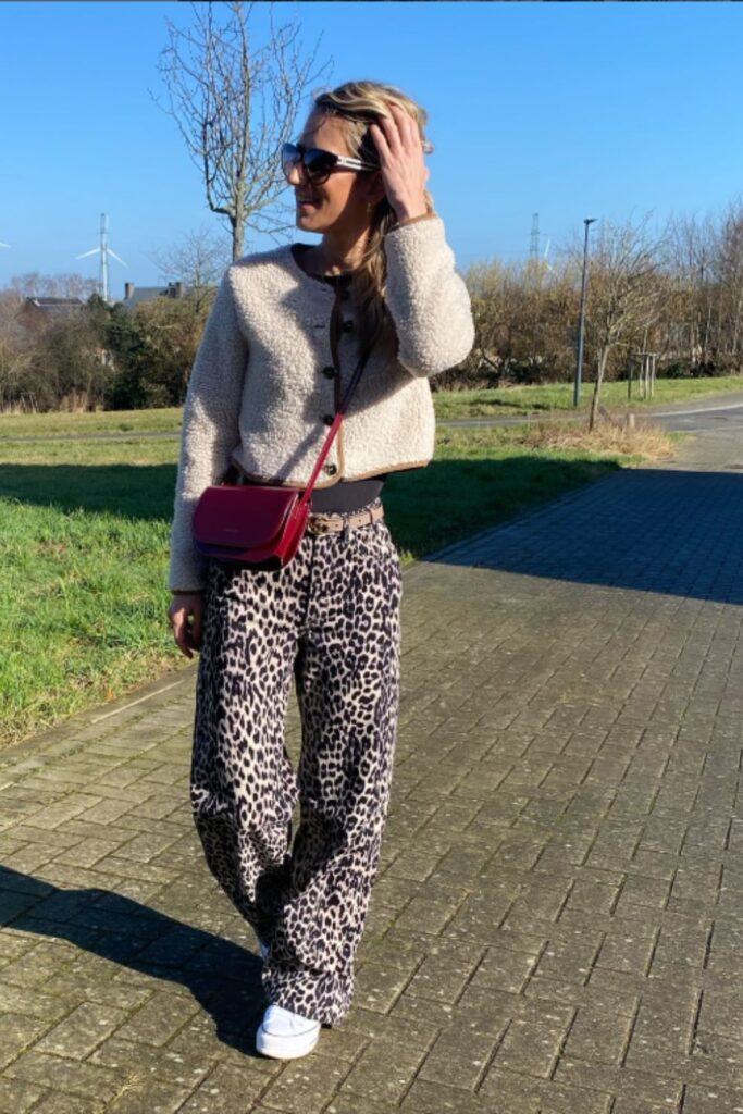 Make a bold statement with a leopard print pants outfit—fun, stylish looks perfect for day-to-night dressing and standout street style. Leopard Print Pants Outfit Street Style, Leopard Print Pants Outfits, Leopard Print Pants Outfit Classy, Leopard Print Wide Leg Pants Outfit, How To Wear Leopard Print Pants
