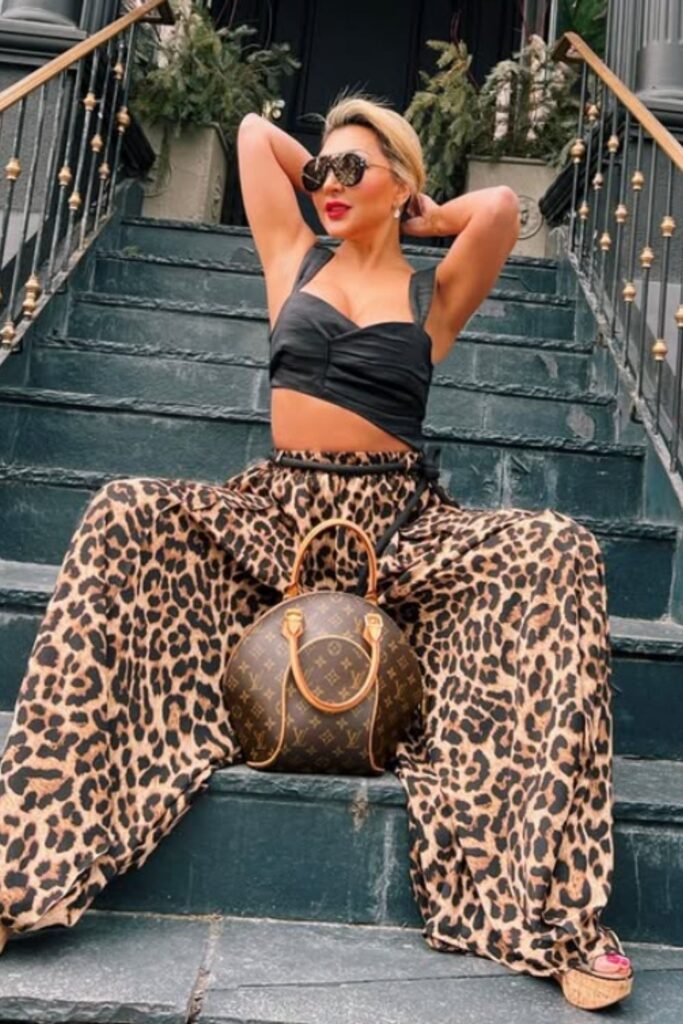 Make a bold statement with a leopard print pants outfit—fun, stylish looks perfect for day-to-night dressing and standout street style. Leopard Print Pants Outfit Street Style, Leopard Print Pants Outfits, Leopard Print Pants Outfit Classy, Leopard Print Wide Leg Pants Outfit, How To Wear Leopard Print Pants