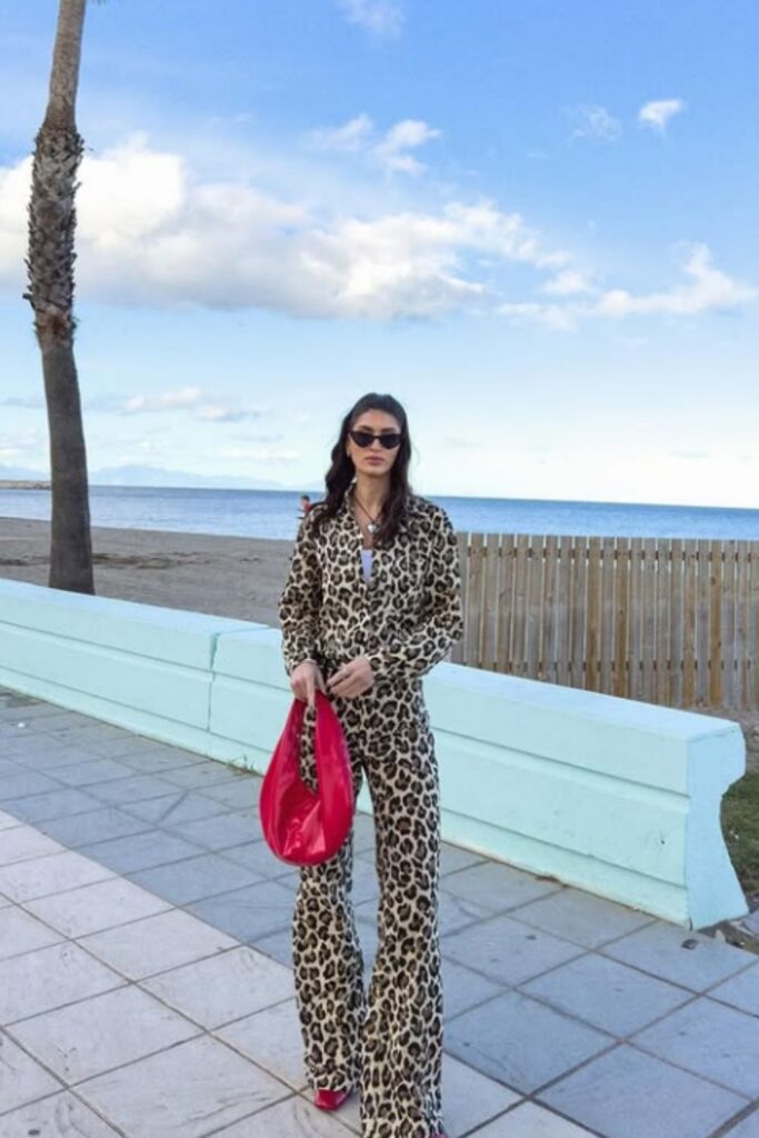 Make a bold statement with a leopard print pants outfit—fun, stylish looks perfect for day-to-night dressing and standout street style. Leopard Print Pants Outfit Street Style, Leopard Print Pants Outfits, Leopard Print Pants Outfit Classy, Leopard Print Wide Leg Pants Outfit, How To Wear Leopard Print Pants