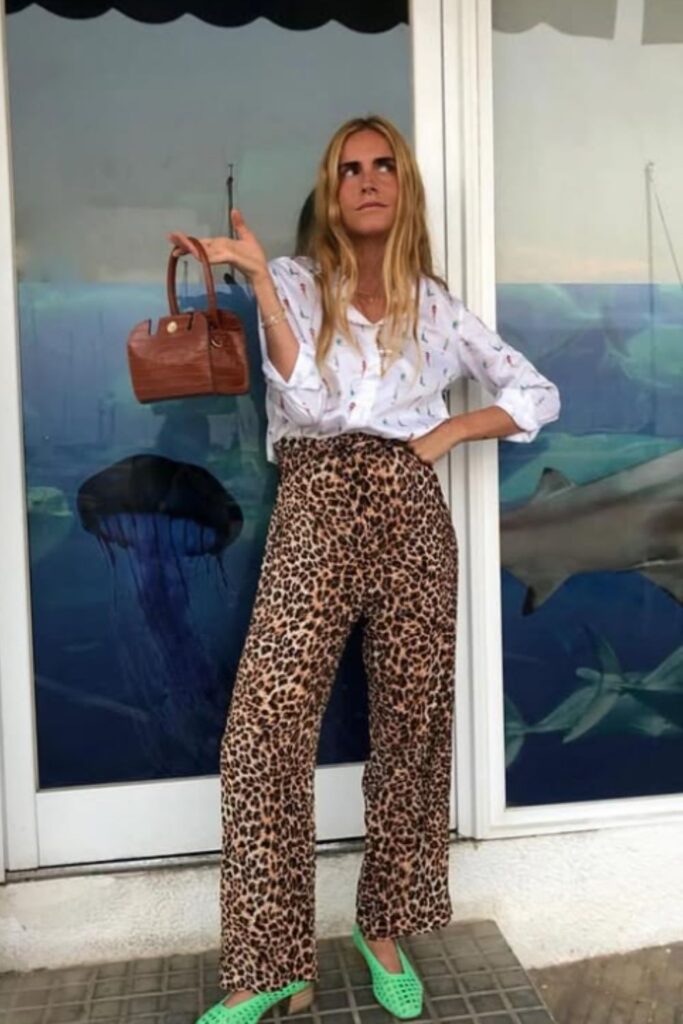 Make a bold statement with a leopard print pants outfit—fun, stylish looks perfect for day-to-night dressing and standout street style. Leopard Print Pants Outfit Street Style, Leopard Print Pants Outfits, Leopard Print Pants Outfit Classy, Leopard Print Wide Leg Pants Outfit, How To Wear Leopard Print Pants