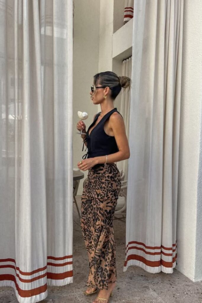 Elevate your wardrobe with chic leopard skirt outfit ideas perfect for brunch, work, travel, and everyday style. Get inspired by bold prints and effortless pairings. Leopard Skirt Outfit, Leopard Print Skirt Outfit, Leopard Mini Skirt Outfit, Leopard Maxi Skirt Outfit, Leopard Midi Skirt Outfit, Short Leopard Skirt Outfit, Leopard Print Mini Skirt Outfit, Leopard Satin Skirt Outfit, Leopard Print Maxi Skirt