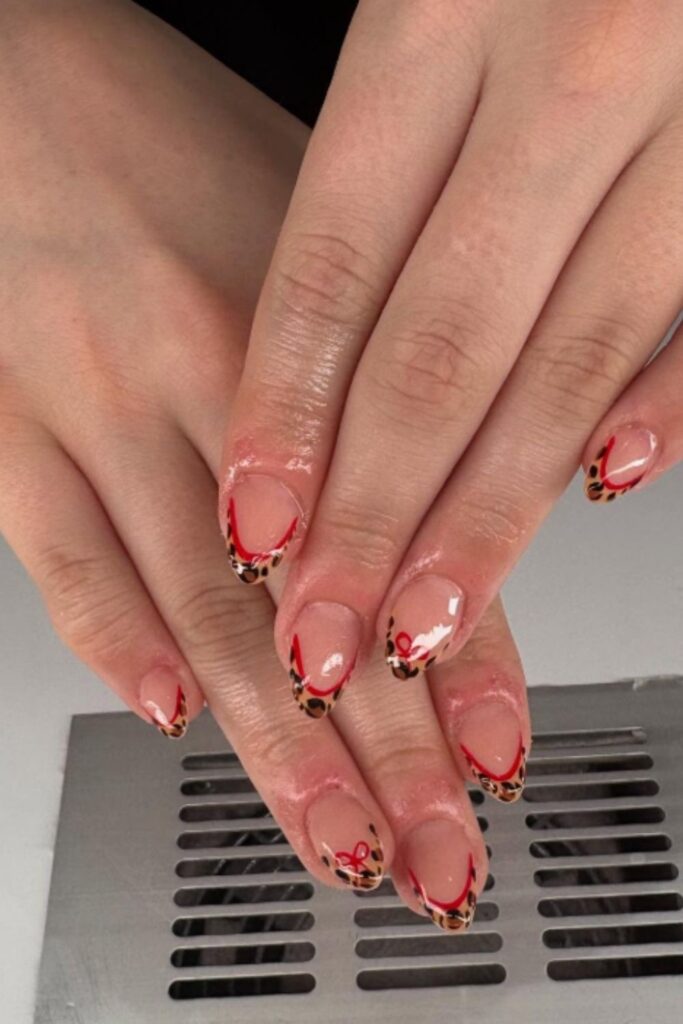 Unleash your wild side with Leopard Print Nails—bold, trendy designs perfect for adding fierce flair to any manicure. Pink Leopard Print Nails, Nails Leopard Print, Red And Leopard Print Nails, Red Leopard Print Nails, Leopard Print Nails French Tip, Leopard Print Nails Pink, Black Leopard Print Nails, White Leopard Print Nails, Leopard Print French Tip Nails, Leopard Print Nails Short