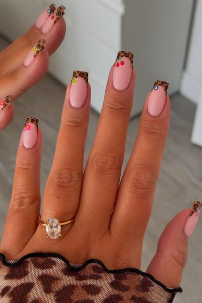 Unleash your wild side with Leopard Print Nails—bold, trendy designs perfect for adding fierce flair to any manicure. Pink Leopard Print Nails, Nails Leopard Print, Red And Leopard Print Nails, Red Leopard Print Nails, Leopard Print Nails French Tip, Leopard Print Nails Pink, Black Leopard Print Nails, White Leopard Print Nails, Leopard Print French Tip Nails, Leopard Print Nails Short