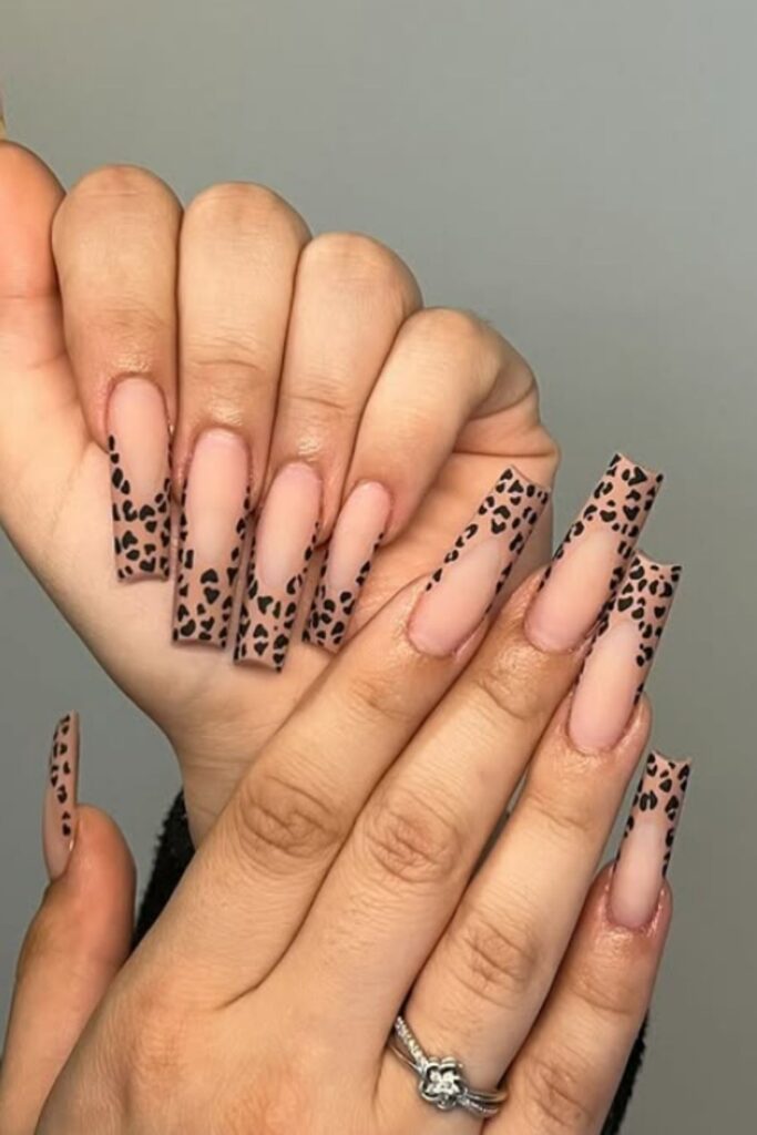 Unleash your wild side with Leopard Print Nails—bold, trendy designs perfect for adding fierce flair to any manicure. Pink Leopard Print Nails, Nails Leopard Print, Red And Leopard Print Nails, Red Leopard Print Nails, Leopard Print Nails French Tip, Leopard Print Nails Pink, Black Leopard Print Nails, White Leopard Print Nails, Leopard Print French Tip Nails, Leopard Print Nails Short