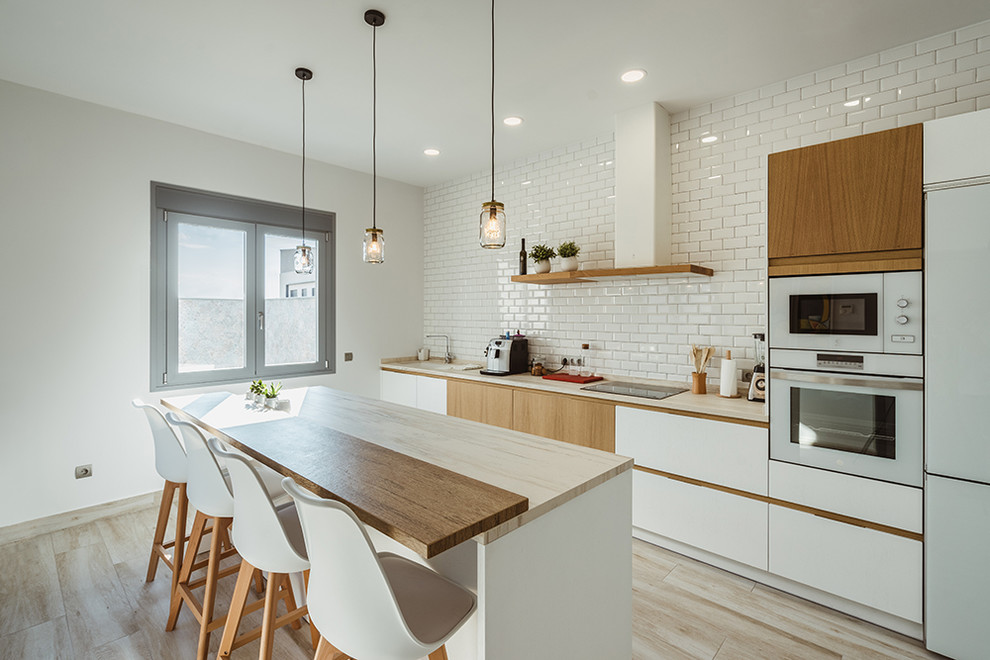 Explore beautiful Scandinavian kitchen ideas that blend minimalist style with cozy charm. Get inspired by real designs featuring light woods, clean lines, and clever storage solutions! , Scandinavian Kitchen Design, Modern Scandinavian Kitchen, Scandinavian Interior Kitchen, Scandinavian Kitchen Ideas, Small Scandinavian Kitchen, Kitchen Inspiration Scandinavian, White Kitchen Ideas Scandinavian, Scandinavian Kitchen Cabinets, Scandinavian Farmhouse Kitchen, Scandinavian Kitchen Island