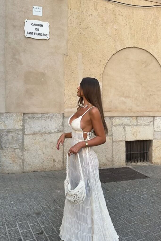 The best Spain outfit ideas for your next vacation—from breezy dresses to chic neutral sets. Get inspired with stylish looks perfect for Mallorca, Marbella, Ibiza, and beyond. Barcelona Spain Outfits, Spain Travel Outfits, Seville Spain Outfits, Spain Style Outfits, Outfits For Spain, Spain Vacation Outfits, Summer In Spain Outfits, Spain Summer Outfit, Madrid Spain Outfit Idea, Spain Jersey Outfit, Mallorca Spain Outfit, Spain Holiday Outfit