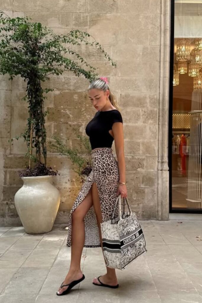 The best Spain outfit ideas for your next vacation—from breezy dresses to chic neutral sets. Get inspired with stylish looks perfect for Mallorca, Marbella, Ibiza, and beyond. Barcelona Spain Outfits, Spain Travel Outfits, Seville Spain Outfits, Spain Style Outfits, Outfits For Spain, Spain Vacation Outfits, Summer In Spain Outfits, Spain Summer Outfit, Madrid Spain Outfit Idea, Spain Jersey Outfit, Mallorca Spain Outfit, Spain Holiday Outfit